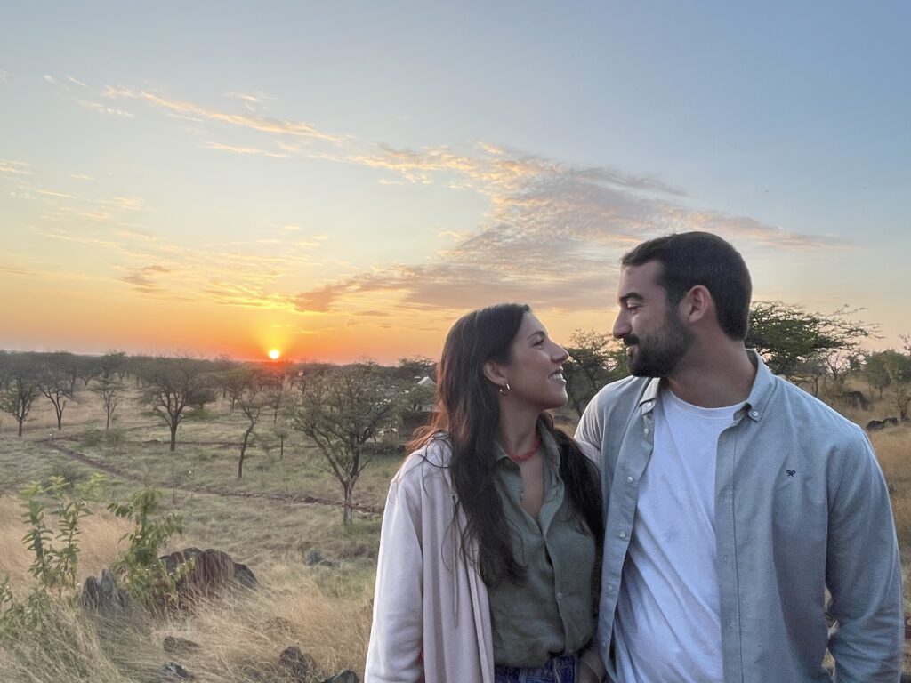 Couple -enjoying -a -romantic Tanzania -luxury -safari experience.”