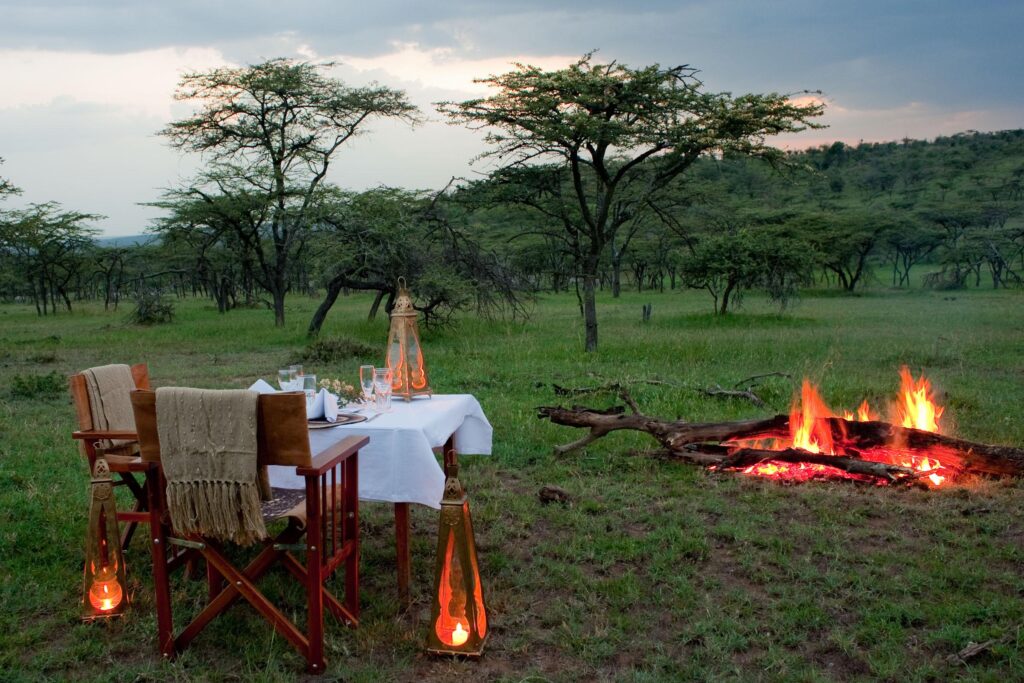 “Luxury safari lodge in Tanzania overlooking the savannah”